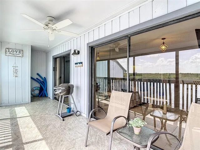 an aerial view of a house with a ocean view