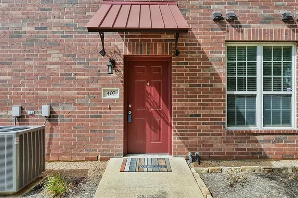 a front view of a house having yard