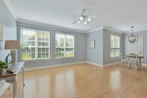 a view of livingroom with furniture window and wooden floor