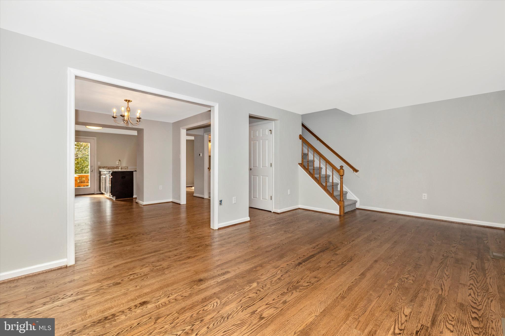 8001 Hollow Reed Court Frederick, MD 21701 - Photo 33 of 33 an empty room with wooden floor and a ceiling fan