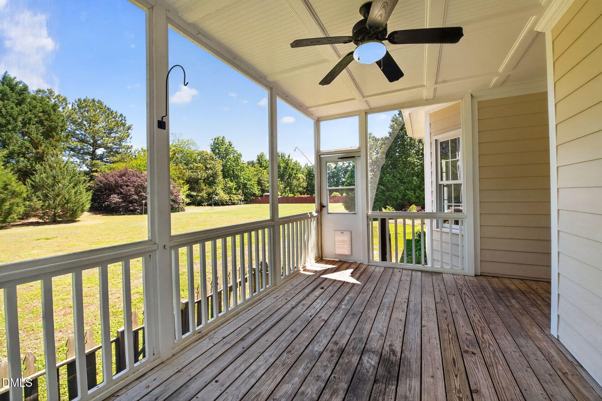 8725 Oregon Inlet Court Raleigh, NC 27603 - Photo 29 of 31 a view of a balcony with wooden floor
