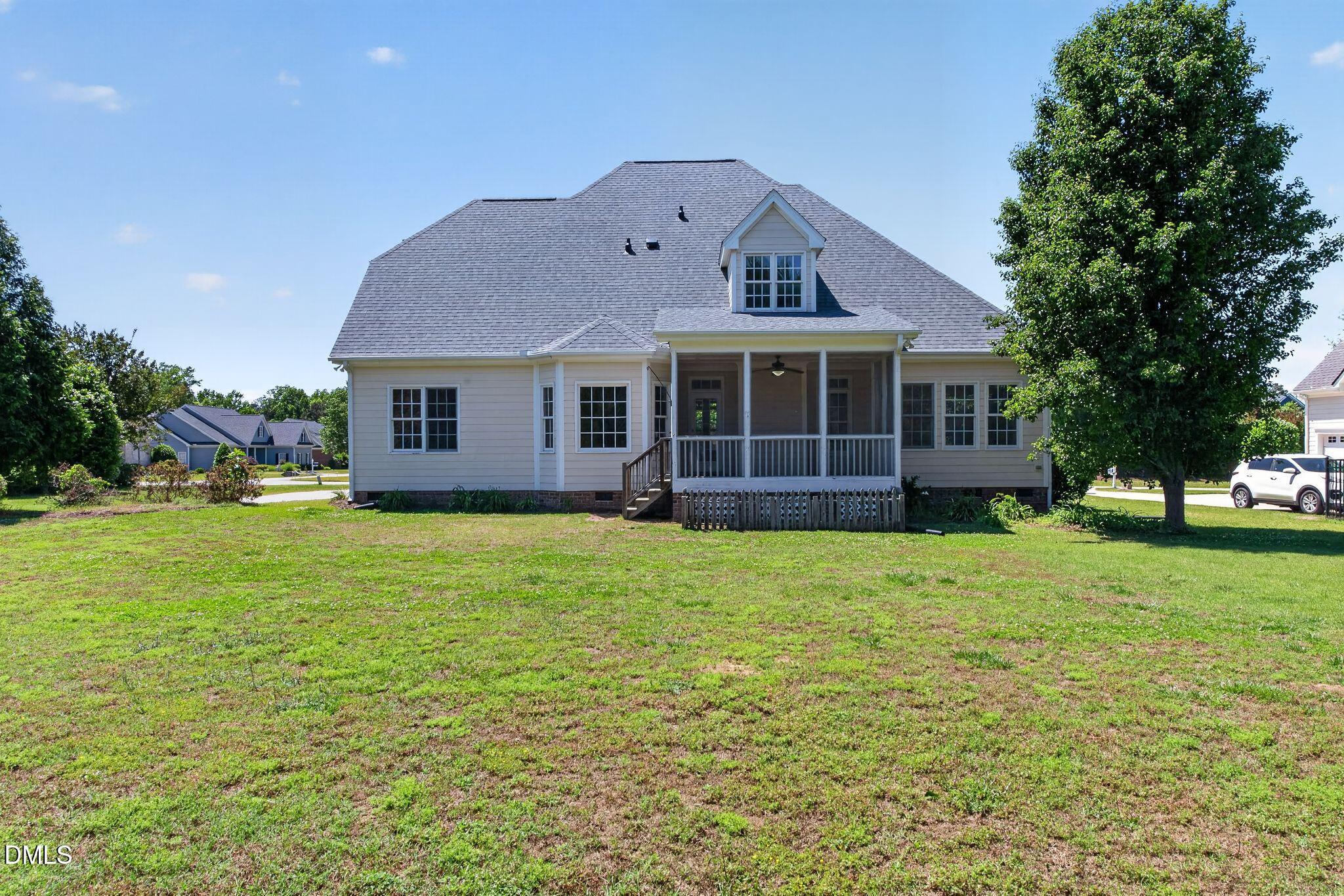 8725 Oregon Inlet Court Raleigh, NC 27603 - Photo 31 of 31 a front view of a house with garden