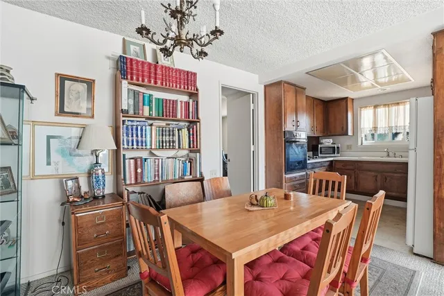 a view of kitchen island with furniture and wooden floor