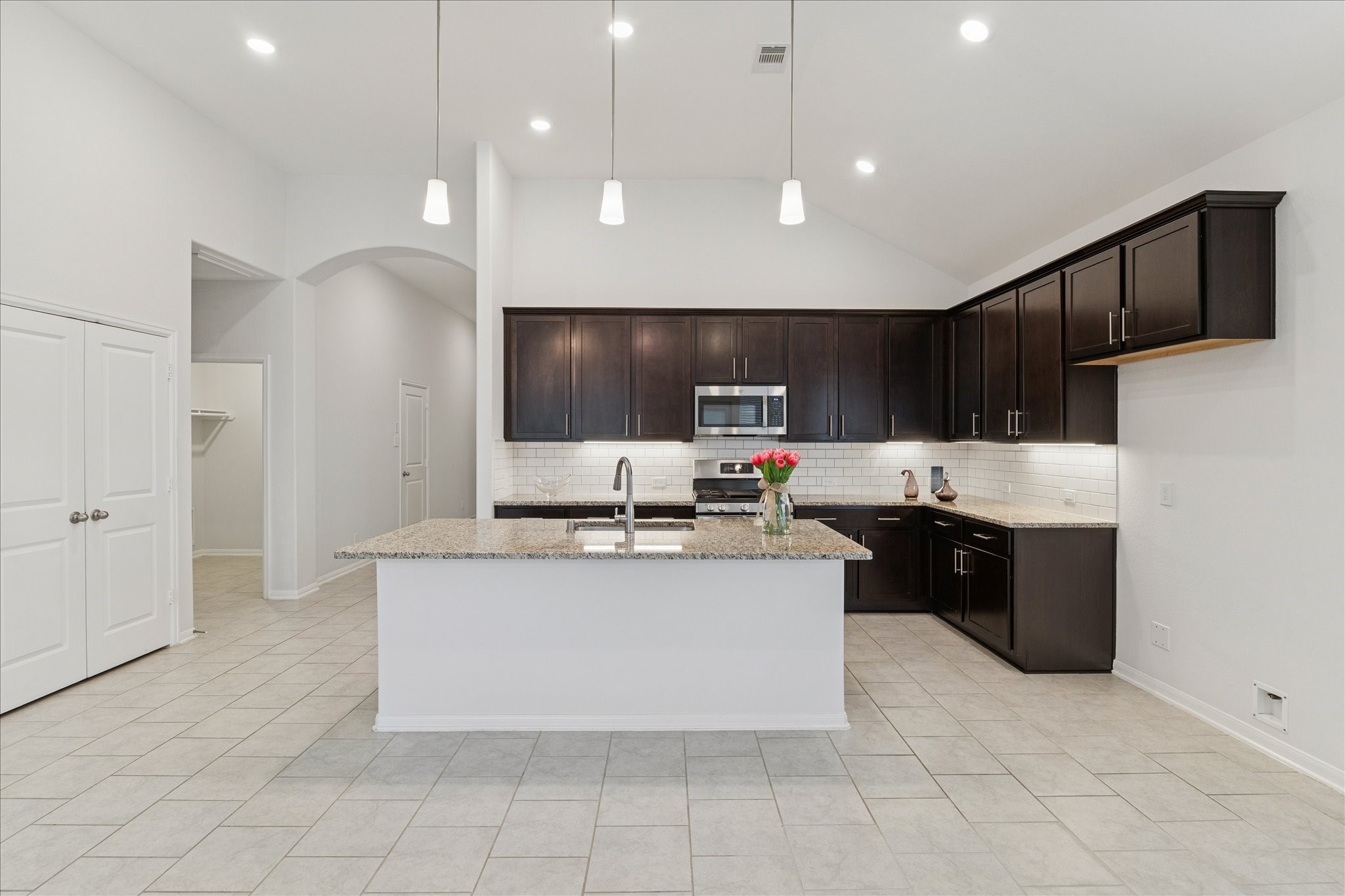 8818 Ruddy Duck Court Baytown, TX 77521 - Photo 12 of 38 An exceptional gathering space designed for hosting family and friends.