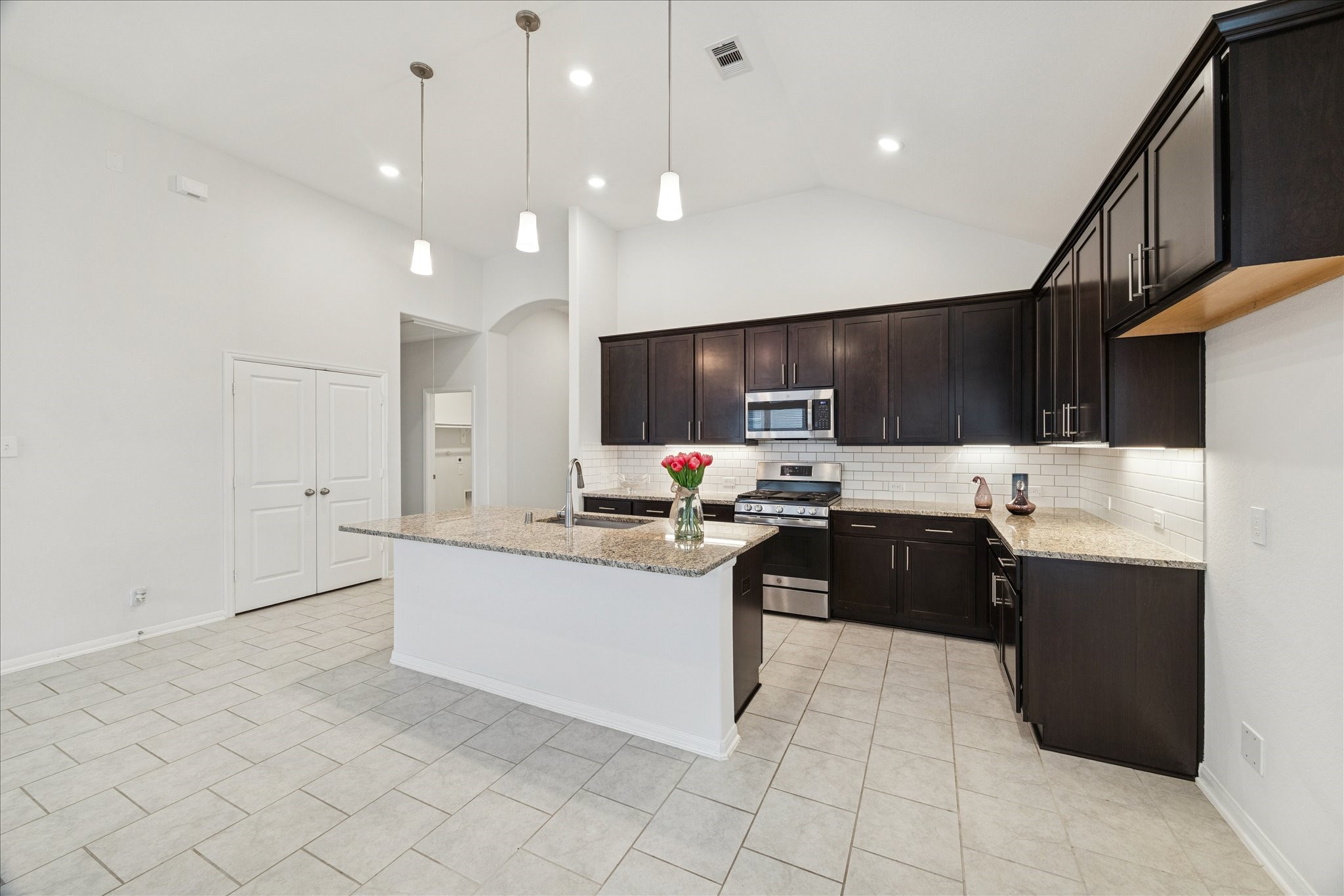 8818 Ruddy Duck Court Baytown, TX 77521 - Photo 13 of 38 The kitchen is simply stunning, one of the standout features of the home.