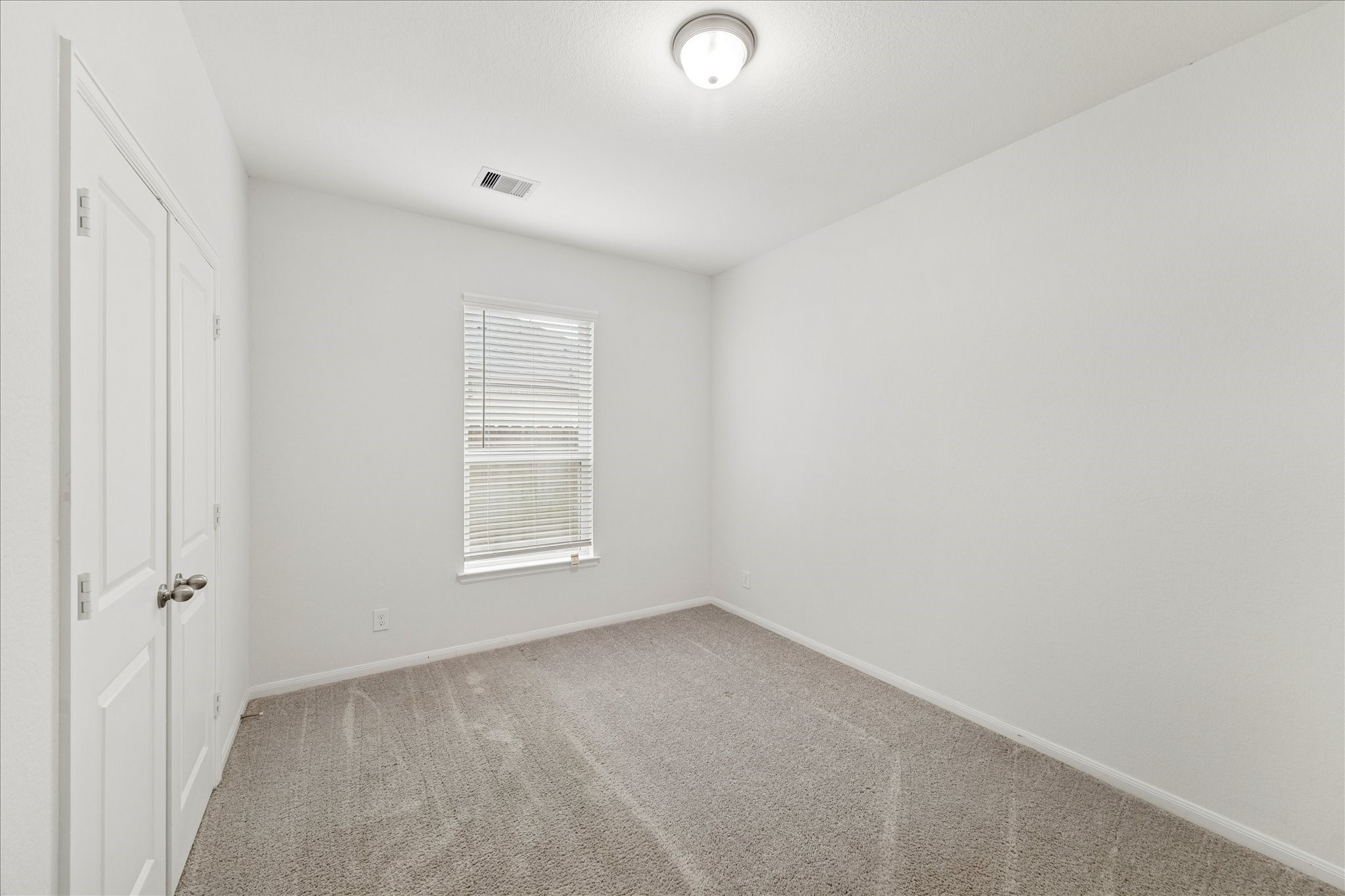 8818 Ruddy Duck Court Baytown, TX 77521 - Photo 26 of 38 A versatile second bedroom, perfectly suited for family or overnight guests.