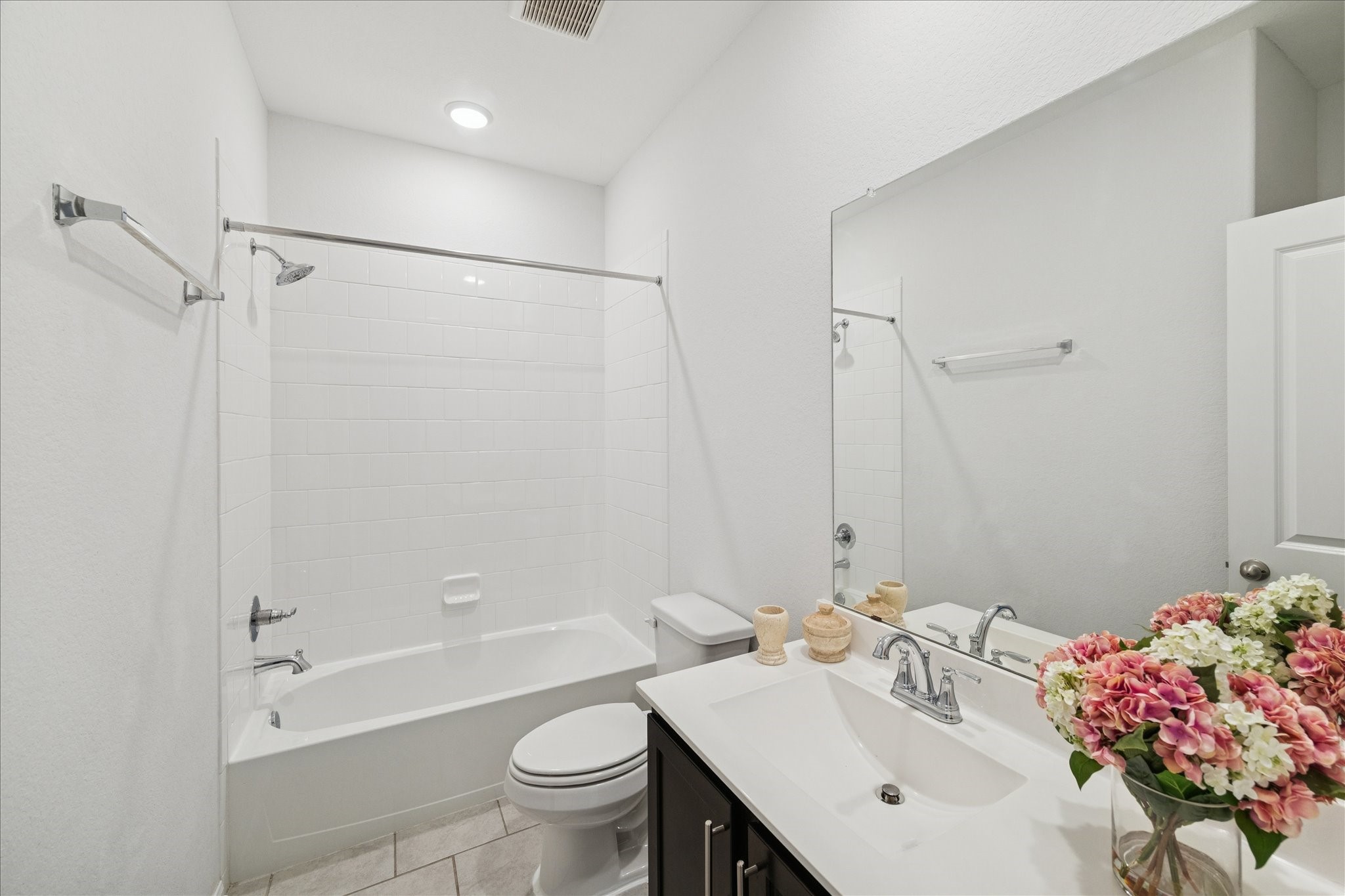 8818 Ruddy Duck Court Baytown, TX 77521 - Photo 28 of 38 A beautifully appointed full bathroom featuring a spacious vanity, walk-in shower, and relaxing tub.