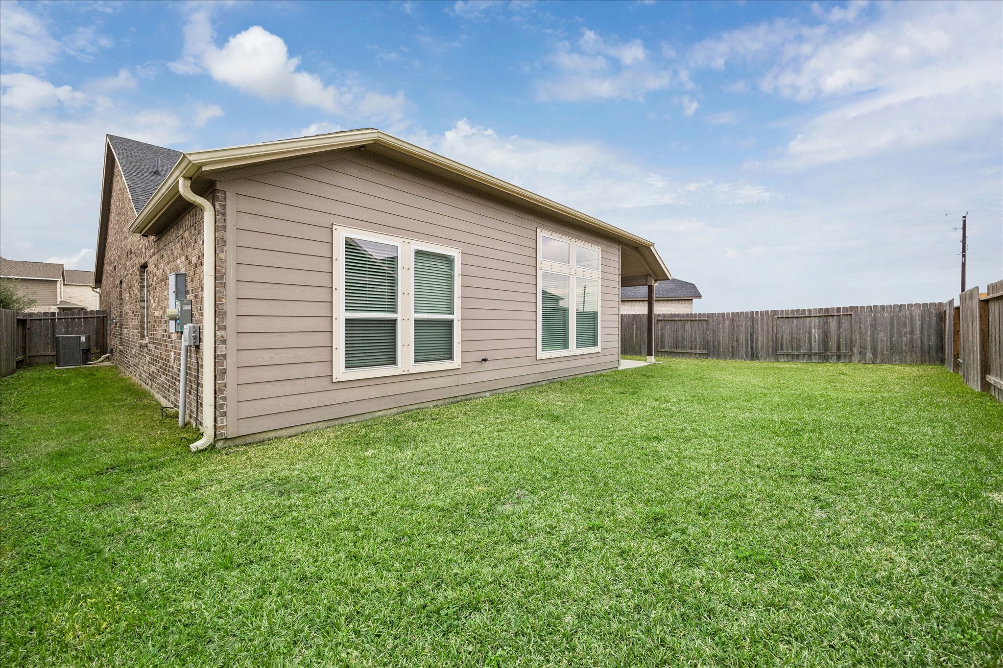 8818 Ruddy Duck Court Baytown, TX 77521 - Photo 31 of 38 A beautifully spacious backyard offering the perfect setting for an afternoon of outdoor enjoyment.