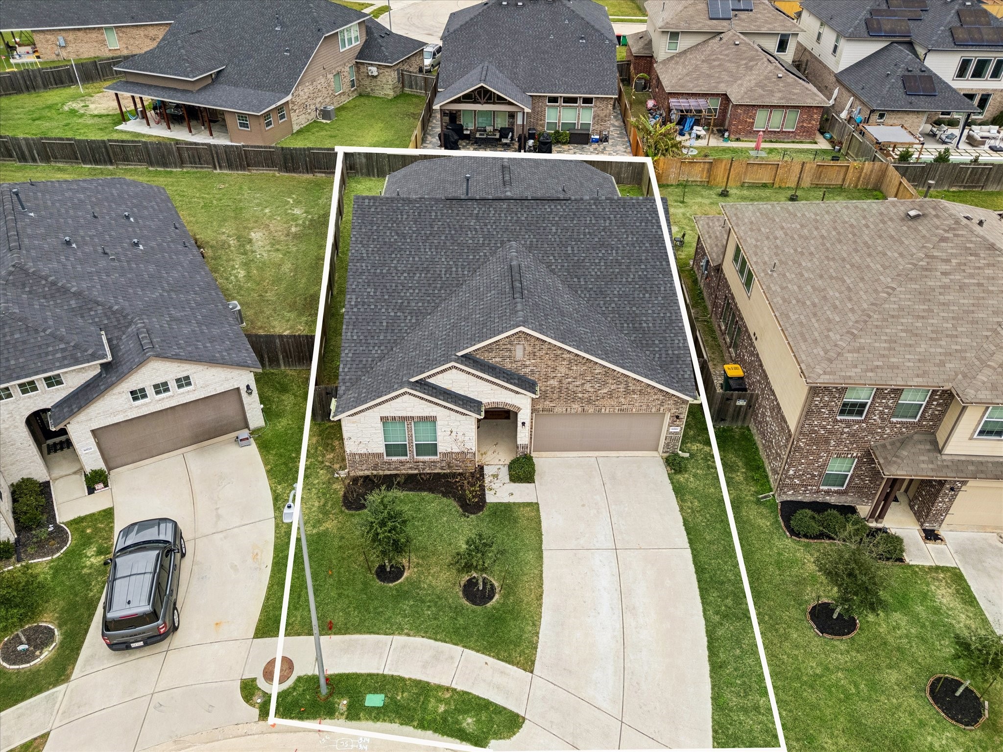 8818 Ruddy Duck Court Baytown, TX 77521 - Photo 4 of 38 A generous front entry paired with a two-car attached garage. Welcome to your beautiful new home!