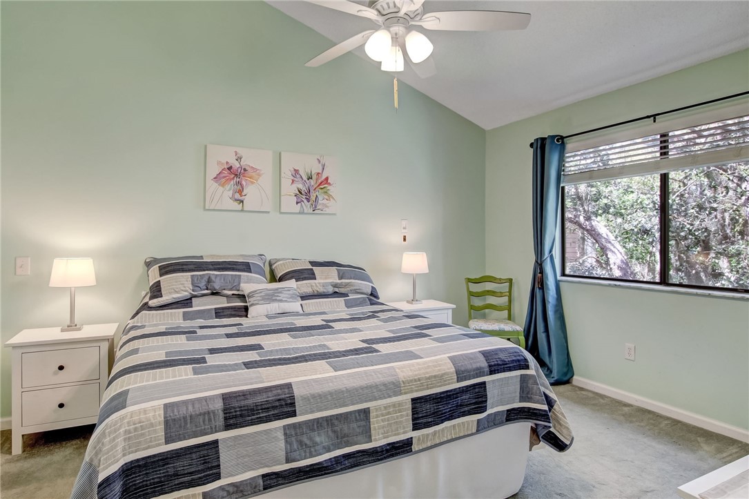 2745 Forest Ridge Drive, Unit I5 Fernandina Beach, FL 32034 - Photo 13 of 32 a bedroom with a bed and a window