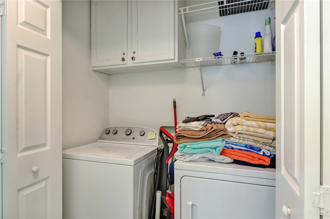 2745 Forest Ridge Drive, Unit I5 Fernandina Beach, FL 32034 - Photo 18 of 32 a utility room with dryer and washer