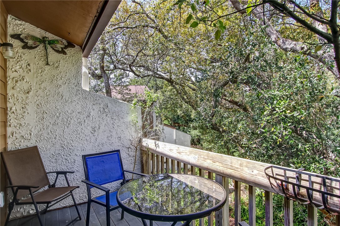 2745 Forest Ridge Drive, Unit I5 Fernandina Beach, FL 32034 - Photo 20 of 32 a view of a balcony with furniture