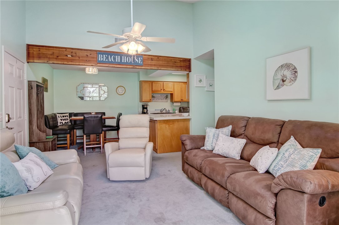 2745 Forest Ridge Drive, Unit I5 Fernandina Beach, FL 32034 - Photo 5 of 32 a living room with furniture and a large window