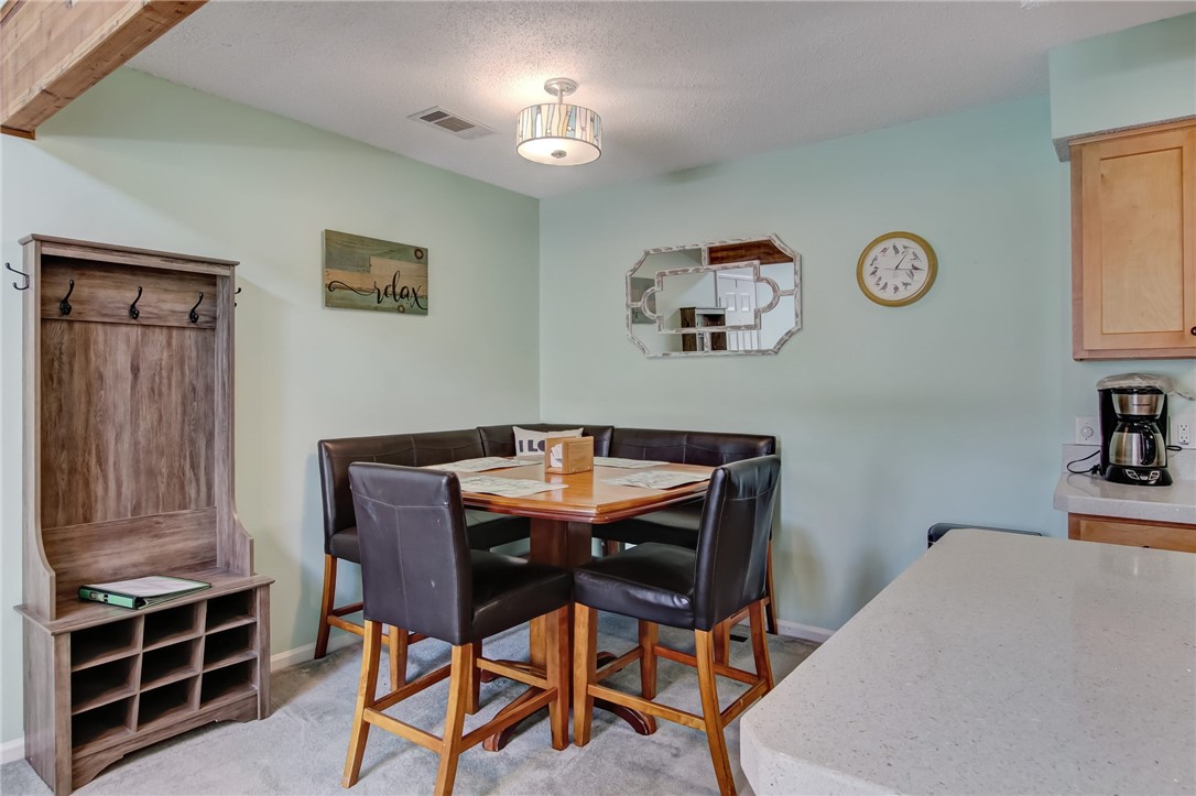 2745 Forest Ridge Drive, Unit I5 Fernandina Beach, FL 32034 - Photo 7 of 32 a view of a dining room with furniture