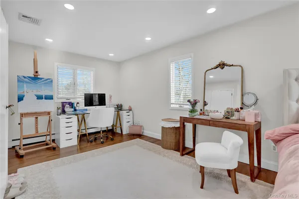 a room with furniture and a chair