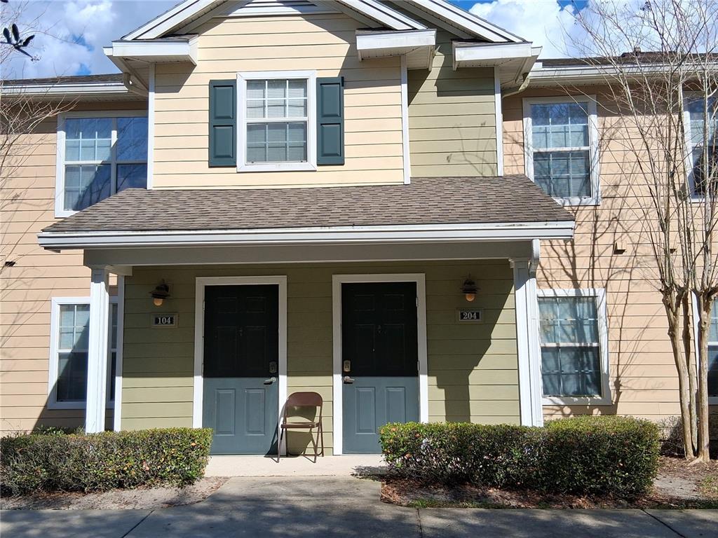 2763 Lighthouse Cove Road, Unit 6204 Orange City, FL 32763 - Photo 1 of 15 a front view of a house with a yard