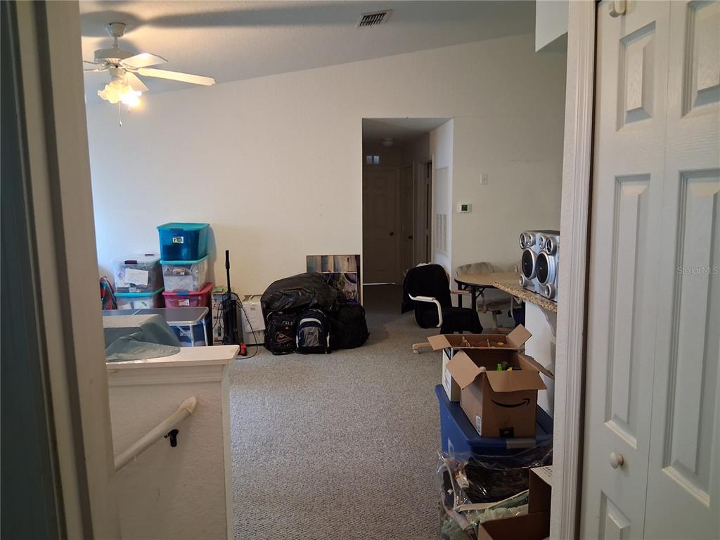 2763 Lighthouse Cove Road, Unit 6204 Orange City, FL 32763 - Photo 5 of 15 a room with storage and utility