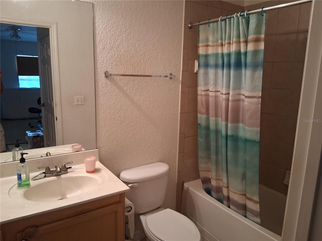 2763 Lighthouse Cove Road, Unit 6204 Orange City, FL 32763 - Photo 9 of 15 a bathroom with a sink toilet and shower