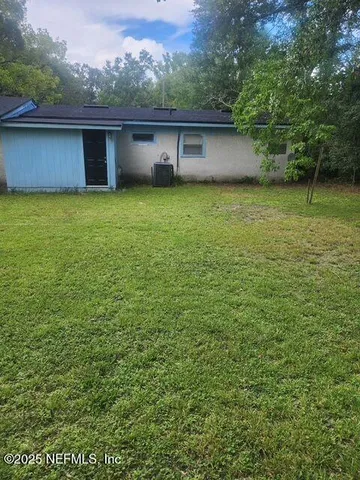 a view of a backyard with a garden