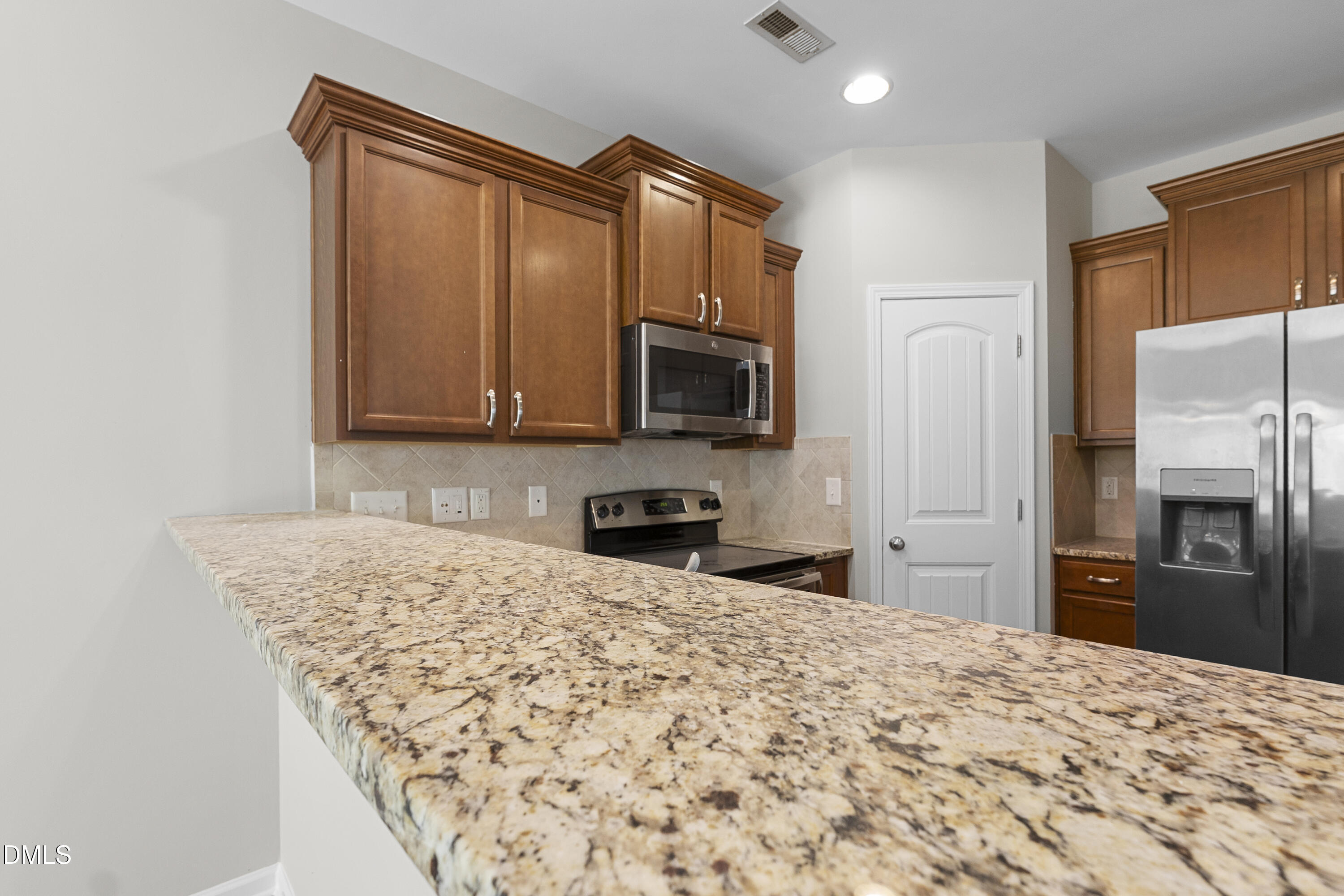 505 Hunters Ridge Drive Fuquay-Varina, NC 27526 - Photo 60 of 65 505_hunters_ridge_kitchen_5
