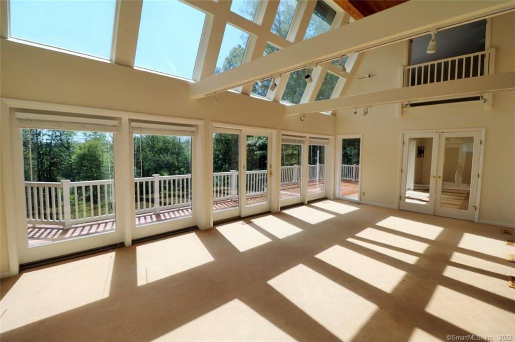 27 Fawn Hill Road Burlington, CT 06013 - Photo 1 of 1 a view of a building from a balcony