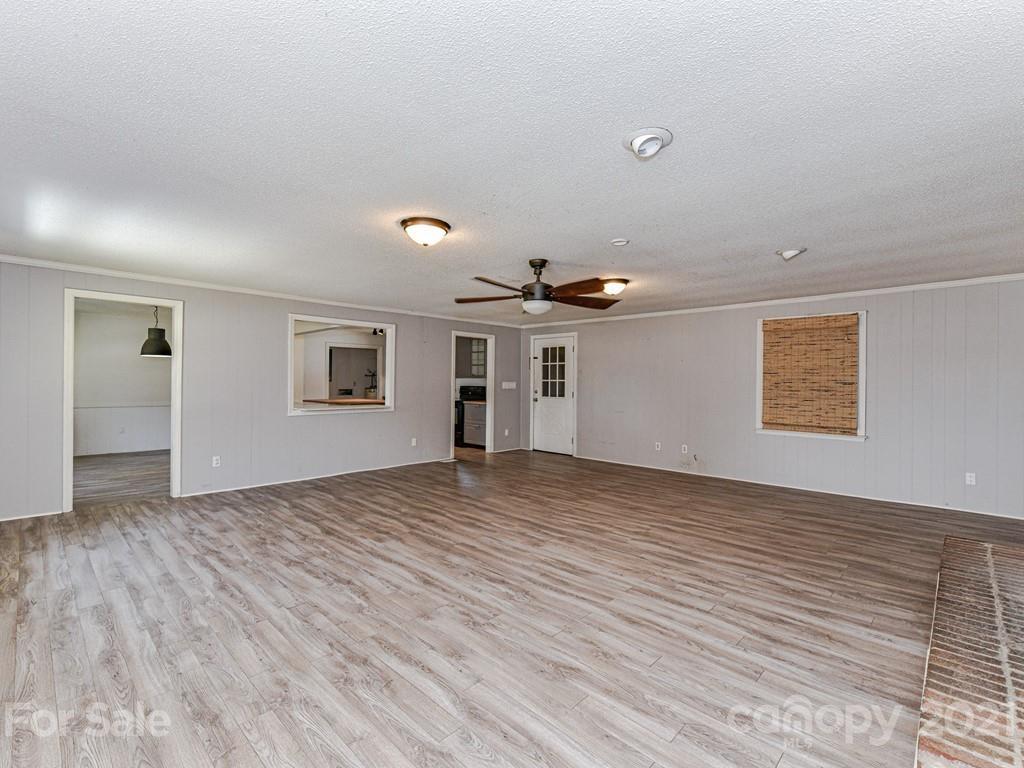 515 Sikes Mill Road Monroe, NC 28110 - Photo 17 of 33 a view of empty room with wooden floor