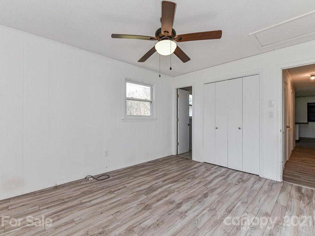 515 Sikes Mill Road Monroe, NC 28110 - Photo 20 of 33 a view of empty room with wooden floor