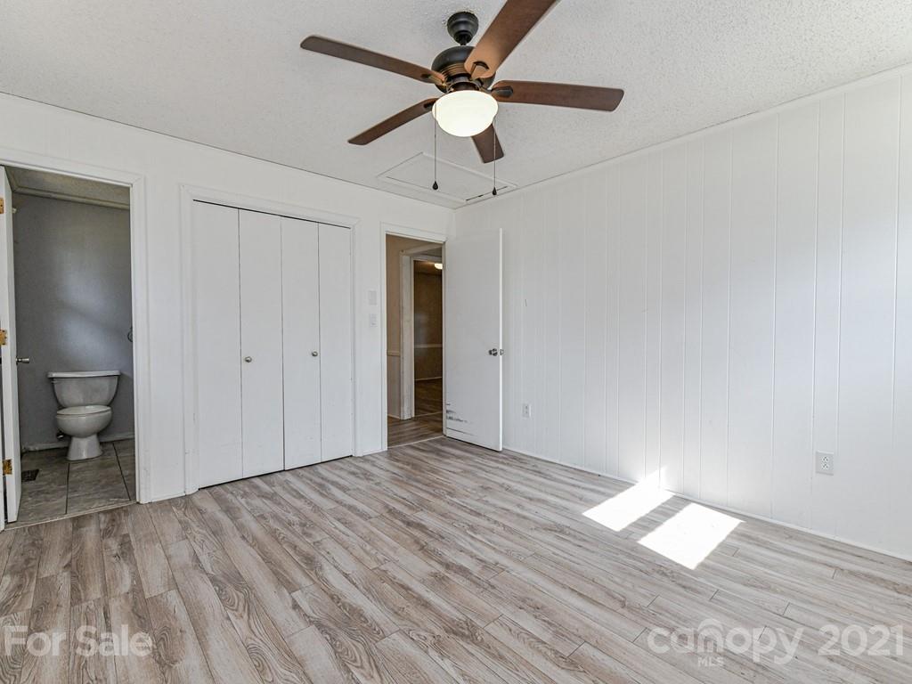 515 Sikes Mill Road Monroe, NC 28110 - Photo 21 of 33 a view of empty room with wooden floor