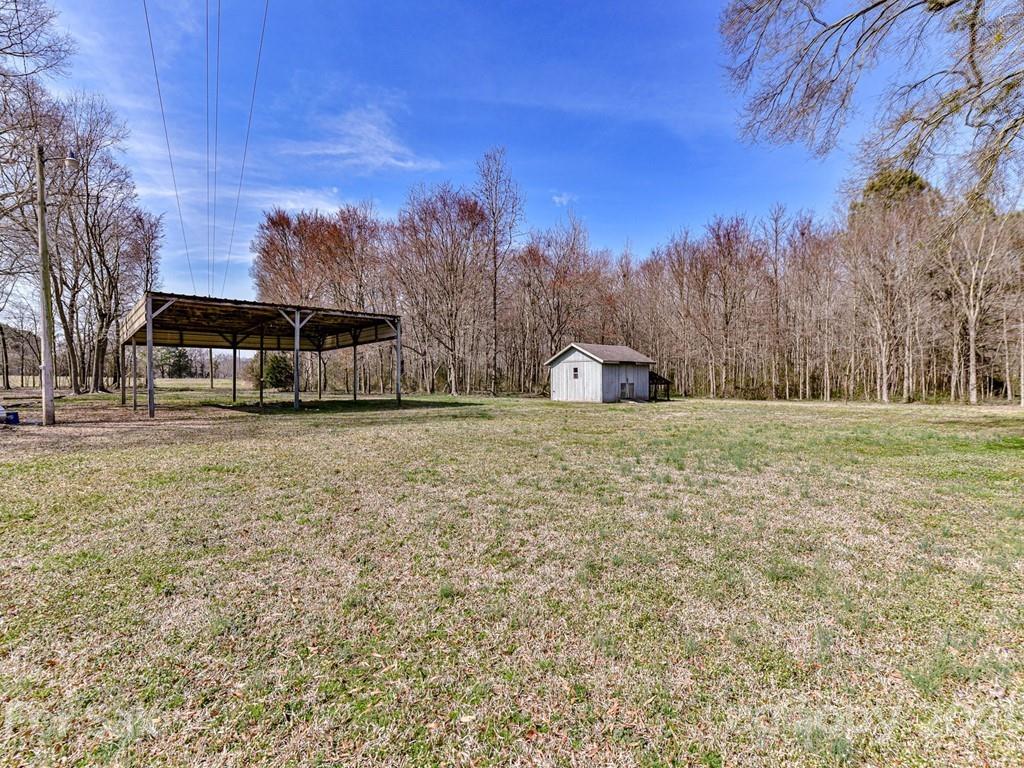515 Sikes Mill Road Monroe, NC 28110 - Photo 29 of 33 a house view with a outdoor space