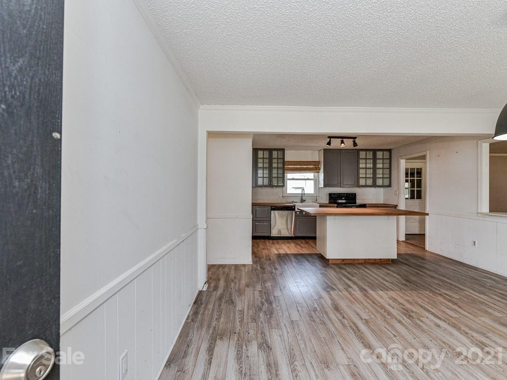 515 Sikes Mill Road Monroe, NC 28110 - Photo 5 of 33 a view of kitchen with wooden floor and electronic appliances