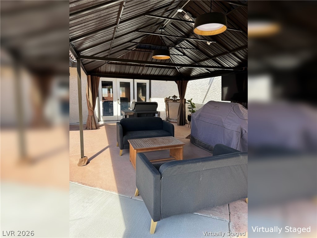 892 North Hollywood Boulevard Las Vegas, NV 89110 - Photo 52 of 81 This inviting outdoor space features a covered patio perfect for relaxation and entertaining.