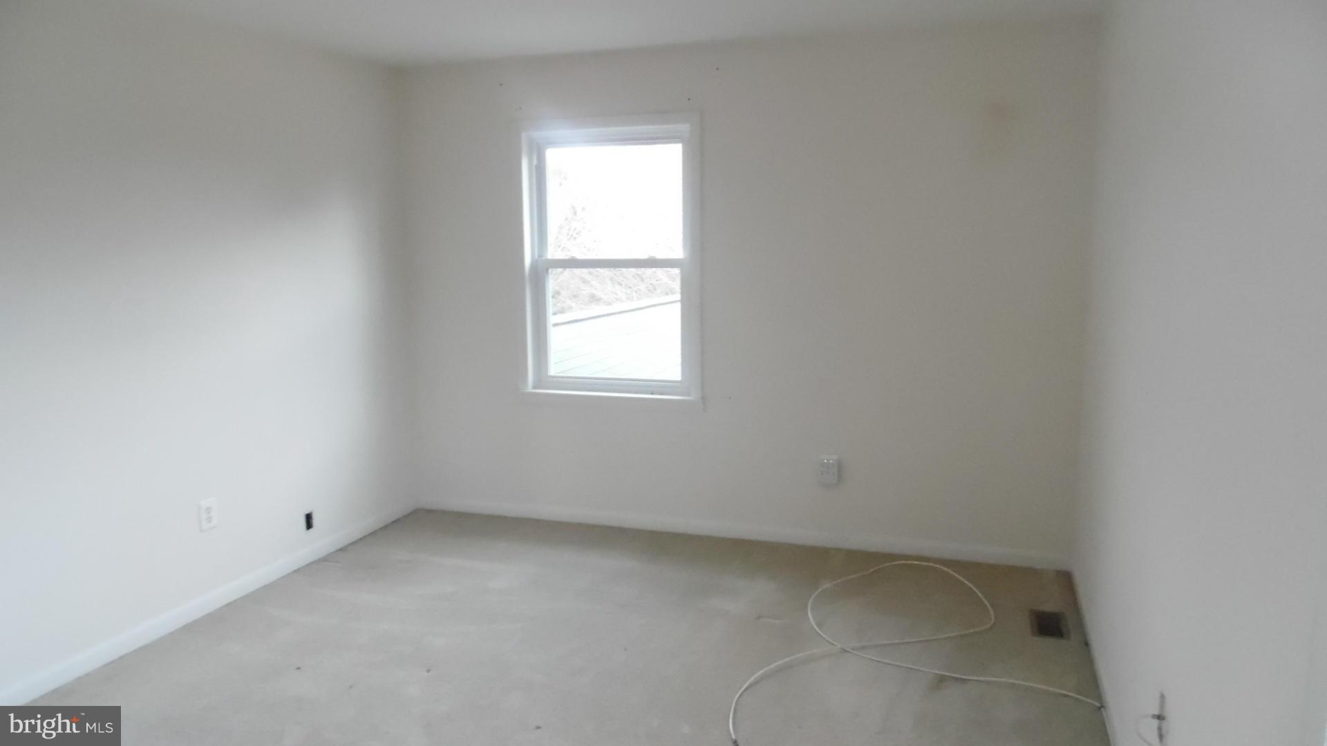 17913 Marshall Mill Road Hampstead, MD 21074 - Photo 13 of 16 an empty room with a window