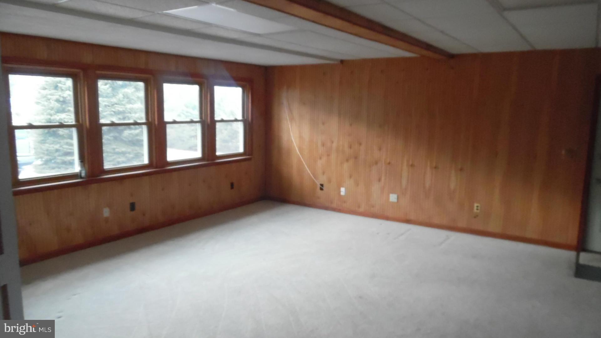 17913 Marshall Mill Road Hampstead, MD 21074 - Photo 4 of 16 an empty room with a window