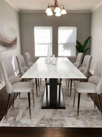 a view of a dining room with furniture