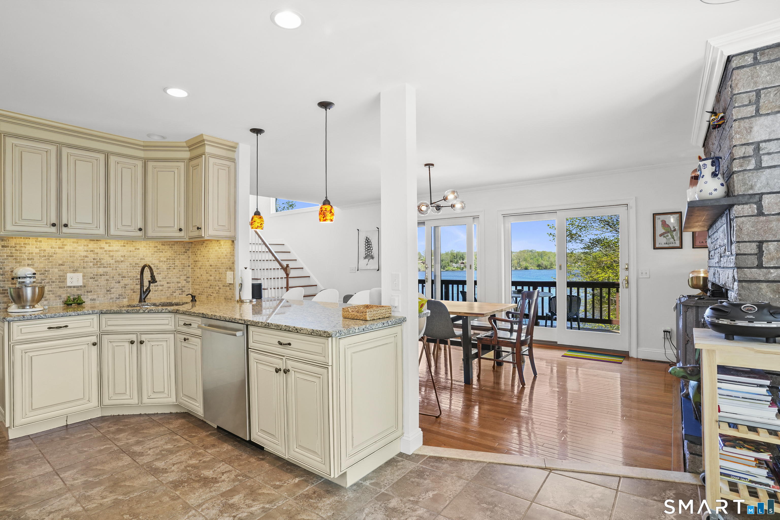 83 Wood Creek Road New Fairfield, CT 06812 - Photo 11 of 40 Nicely updated kitchen with open plan to dining room.