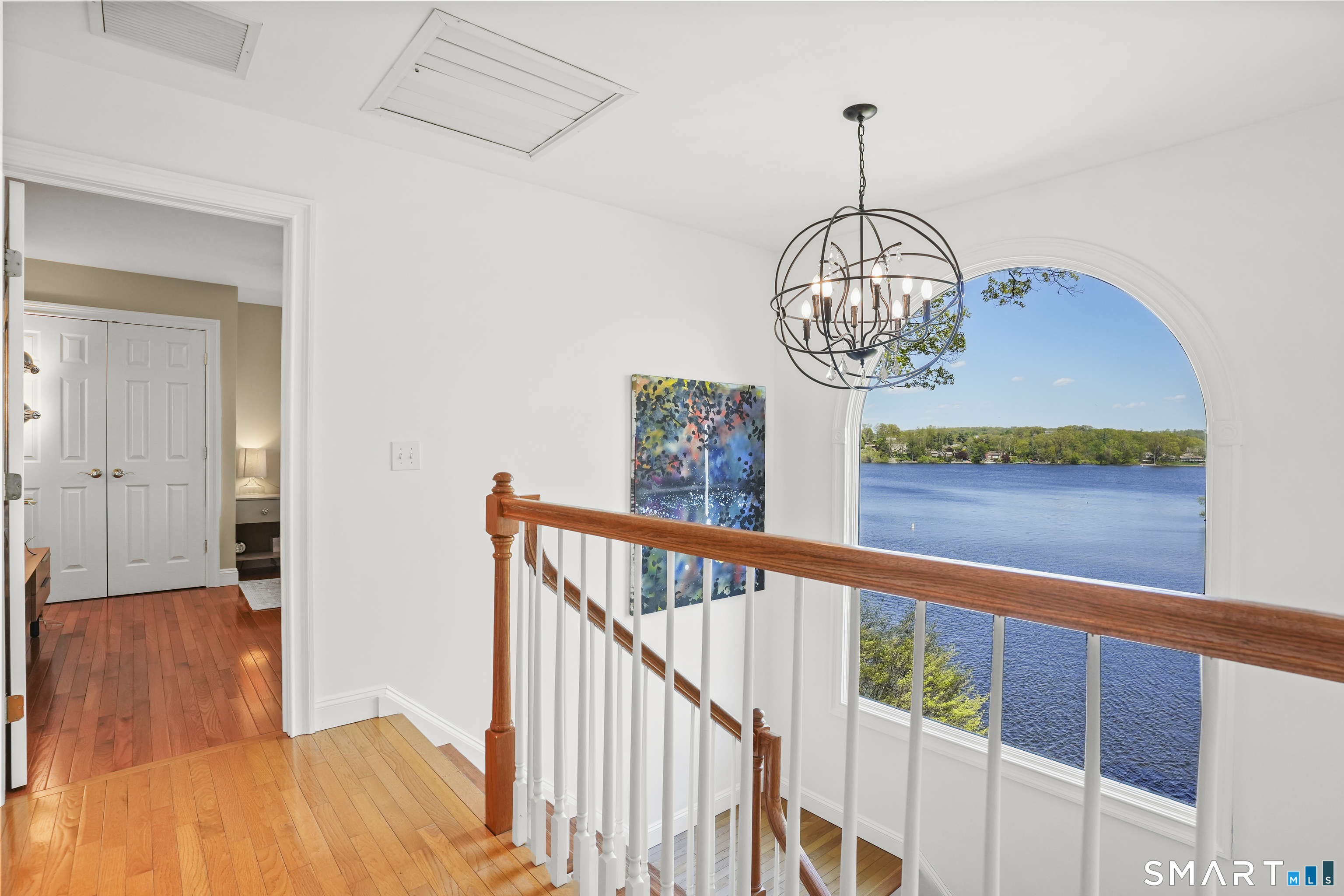 83 Wood Creek Road New Fairfield, CT 06812 - Photo 22 of 40 Oversized window and staircase. Great natural light and views.