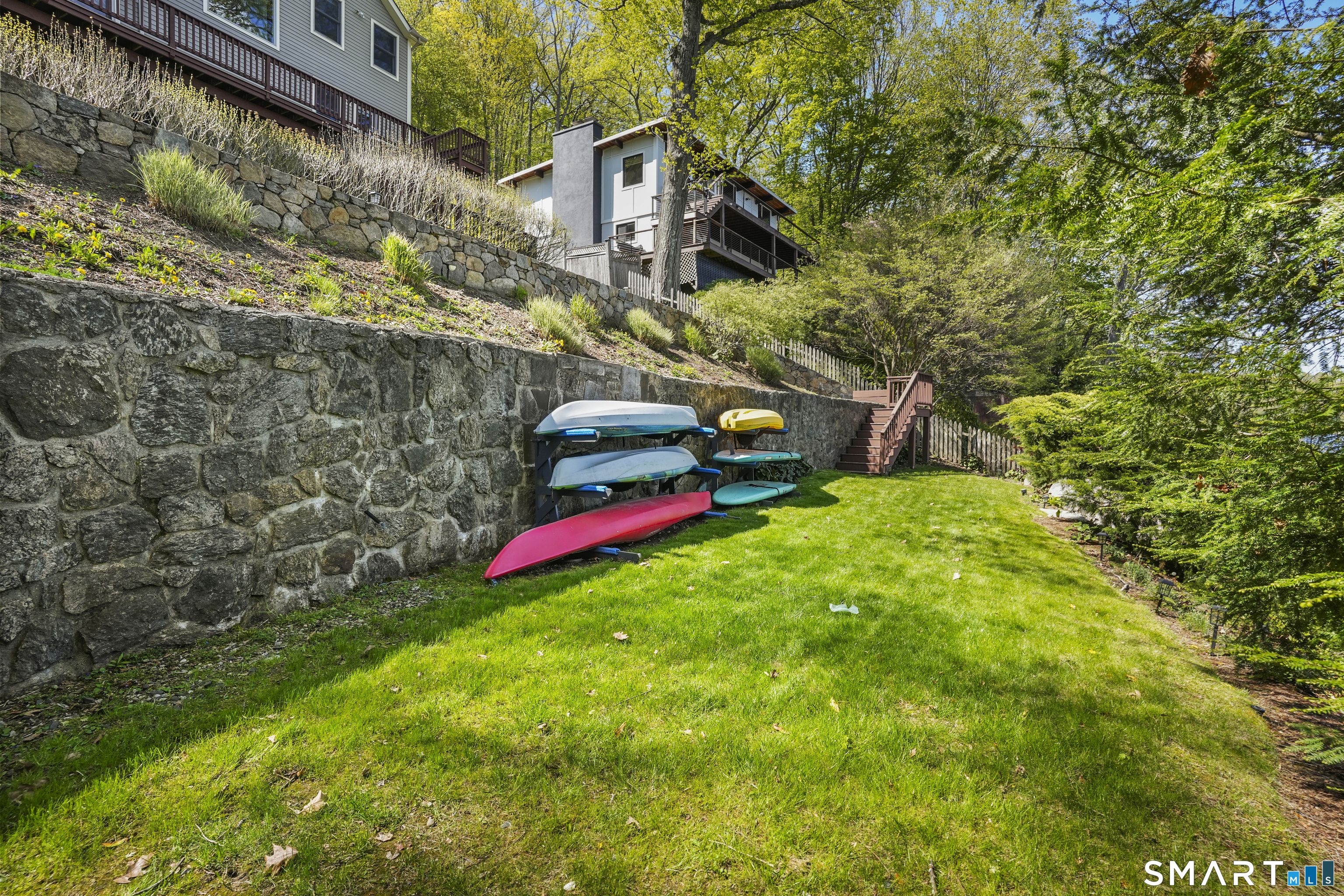 83 Wood Creek Road New Fairfield, CT 06812 - Photo 33 of 40 Terraced landscaping down to the water