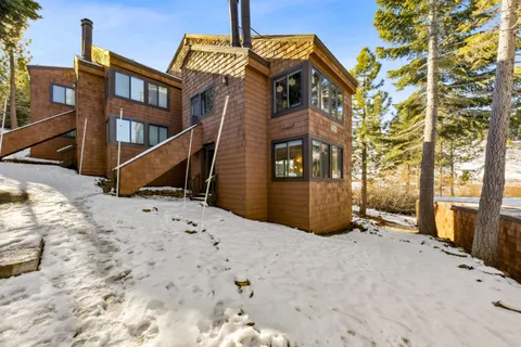 a view of a house with a snow on the wall