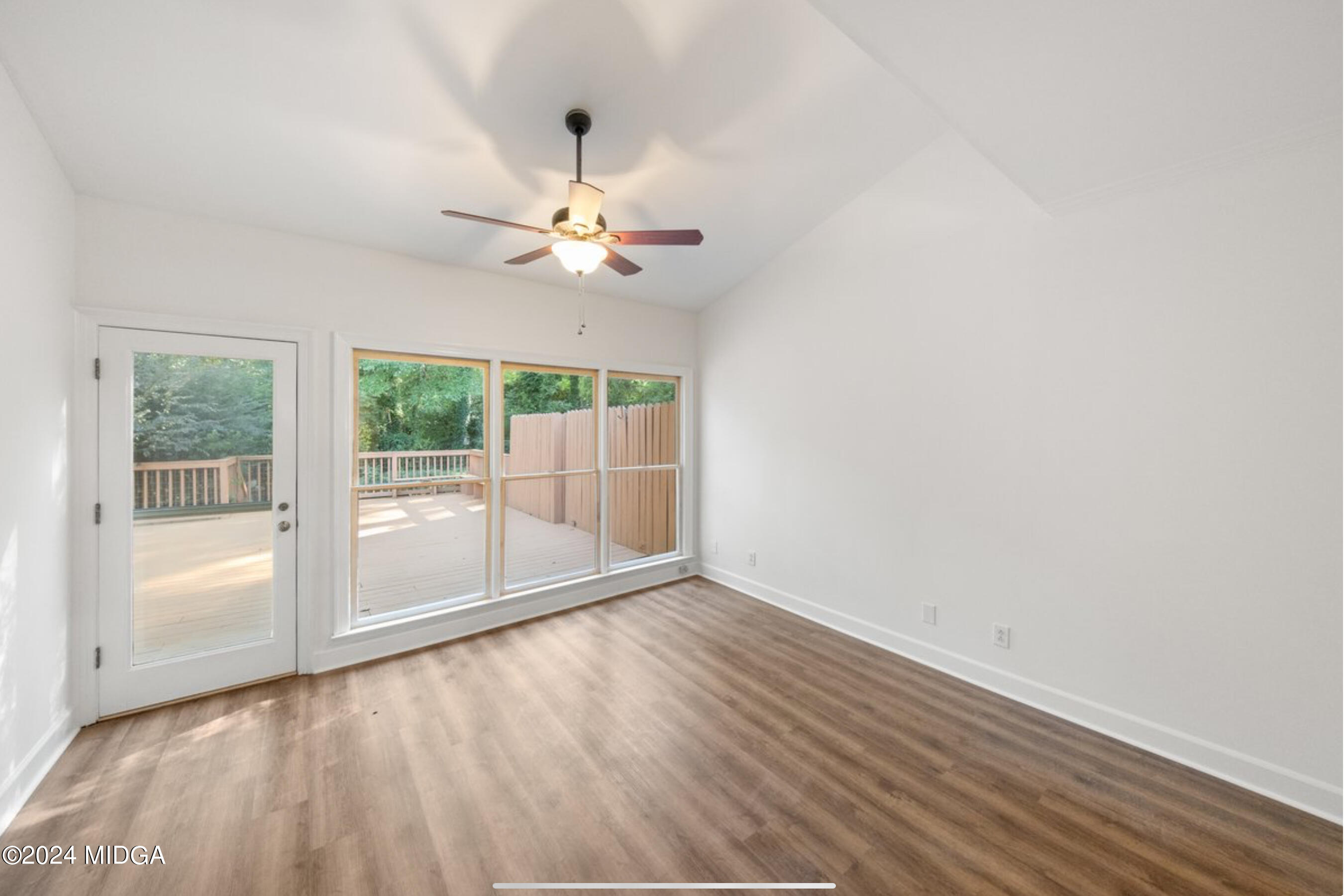 154 Lokchapee Landing Macon, GA 31210 - Photo 13 of 29 wooden floor in an empty room with a window