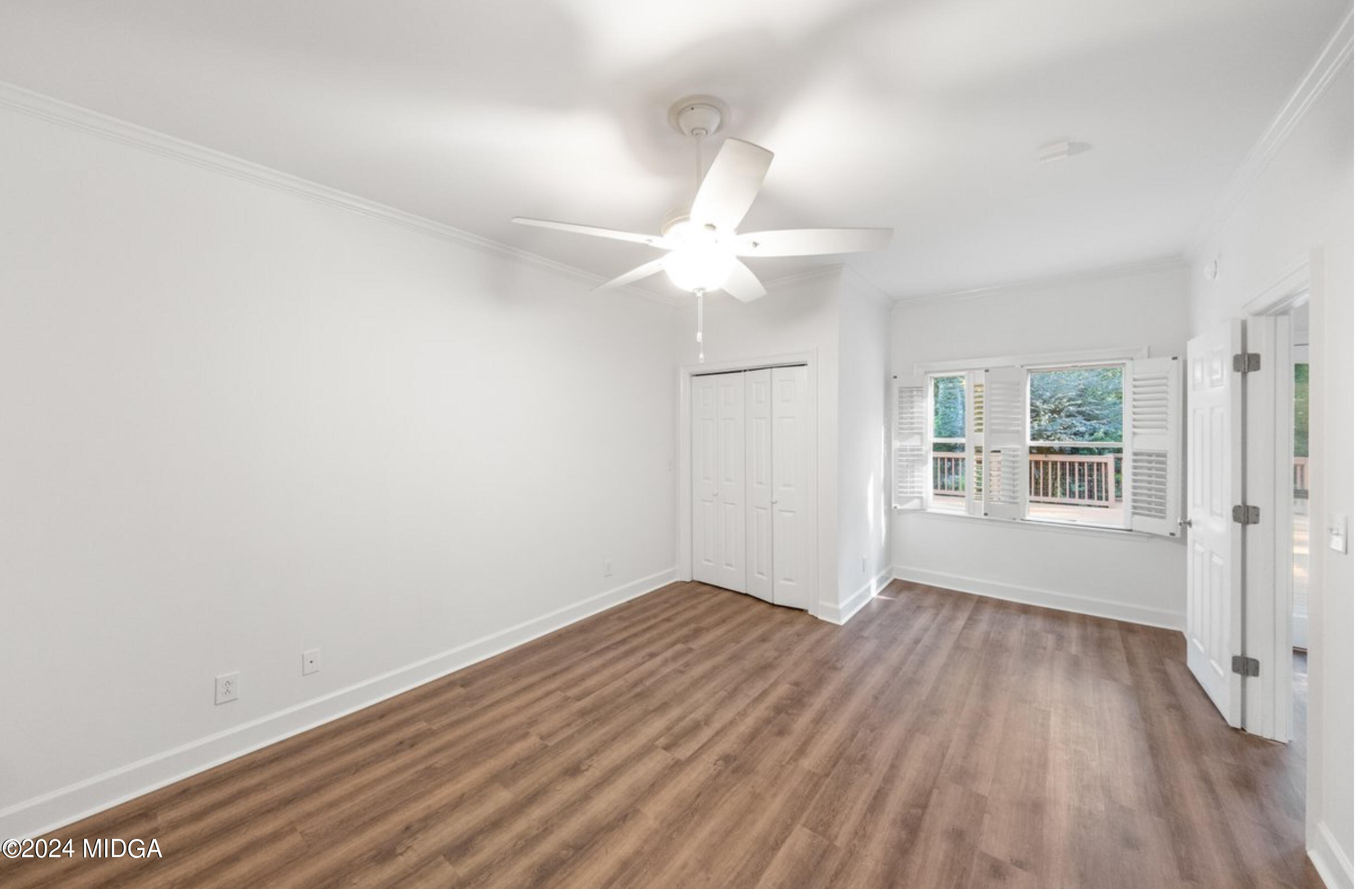 154 Lokchapee Landing Macon, GA 31210 - Photo 16 of 29 wooden floor in an empty room with a window