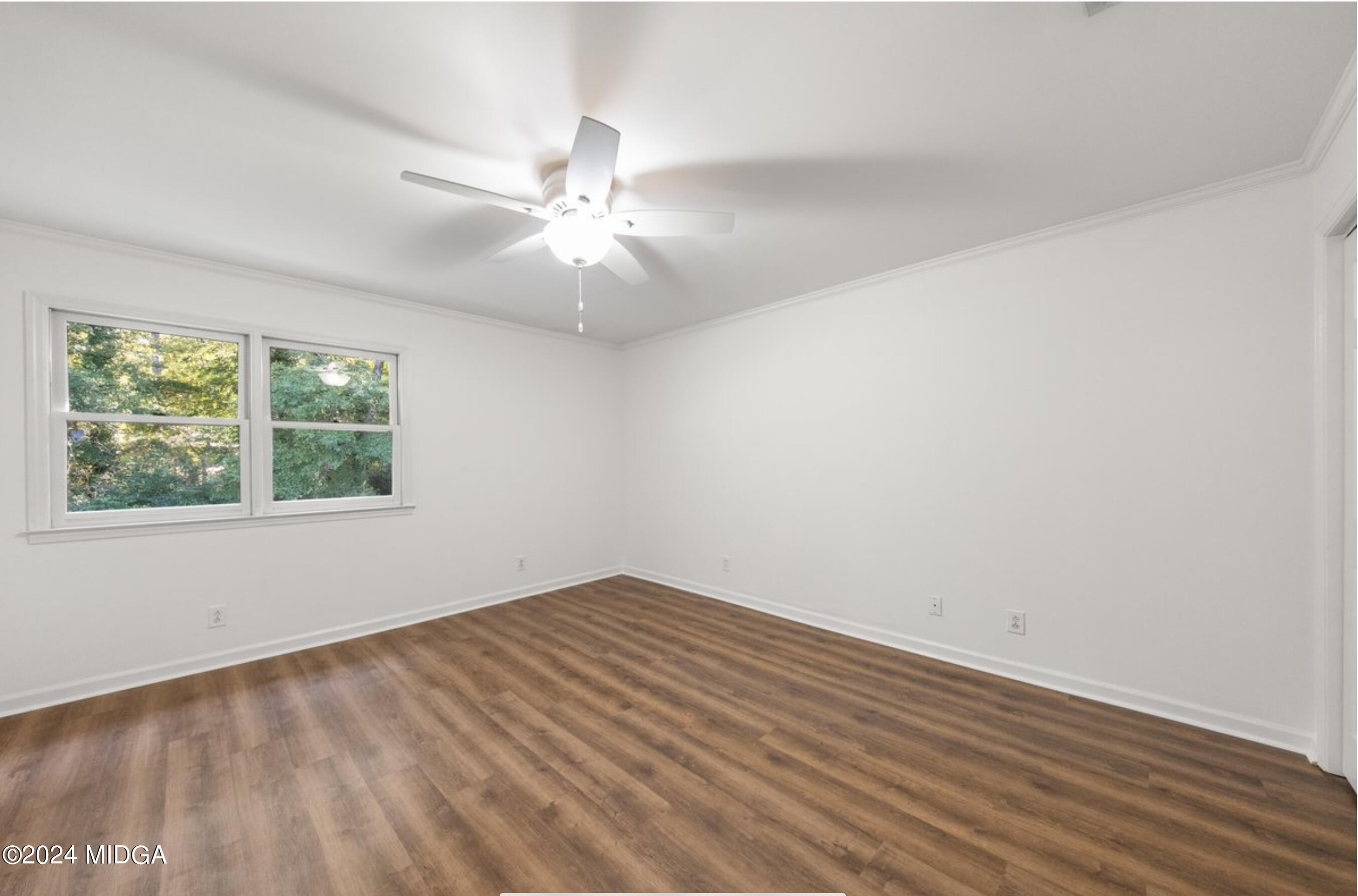 154 Lokchapee Landing Macon, GA 31210 - Photo 21 of 29 wooden floor in an empty room with a window