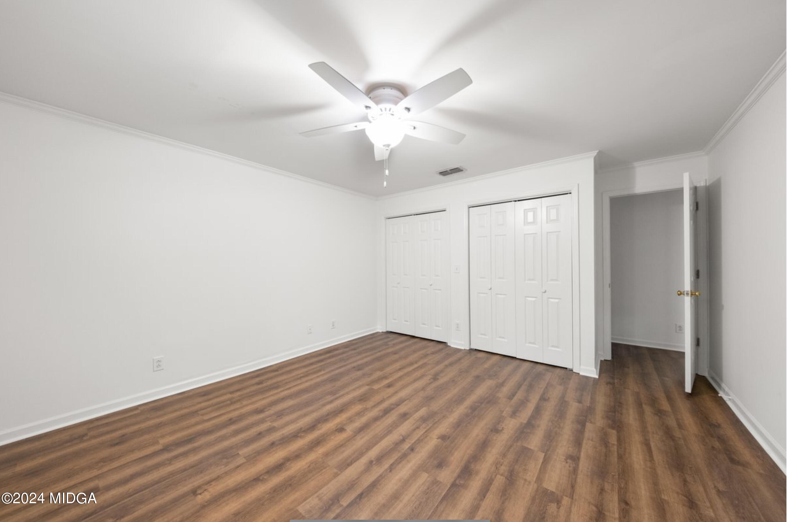 154 Lokchapee Landing Macon, GA 31210 - Photo 22 of 29 a view of an empty room with wooden floor