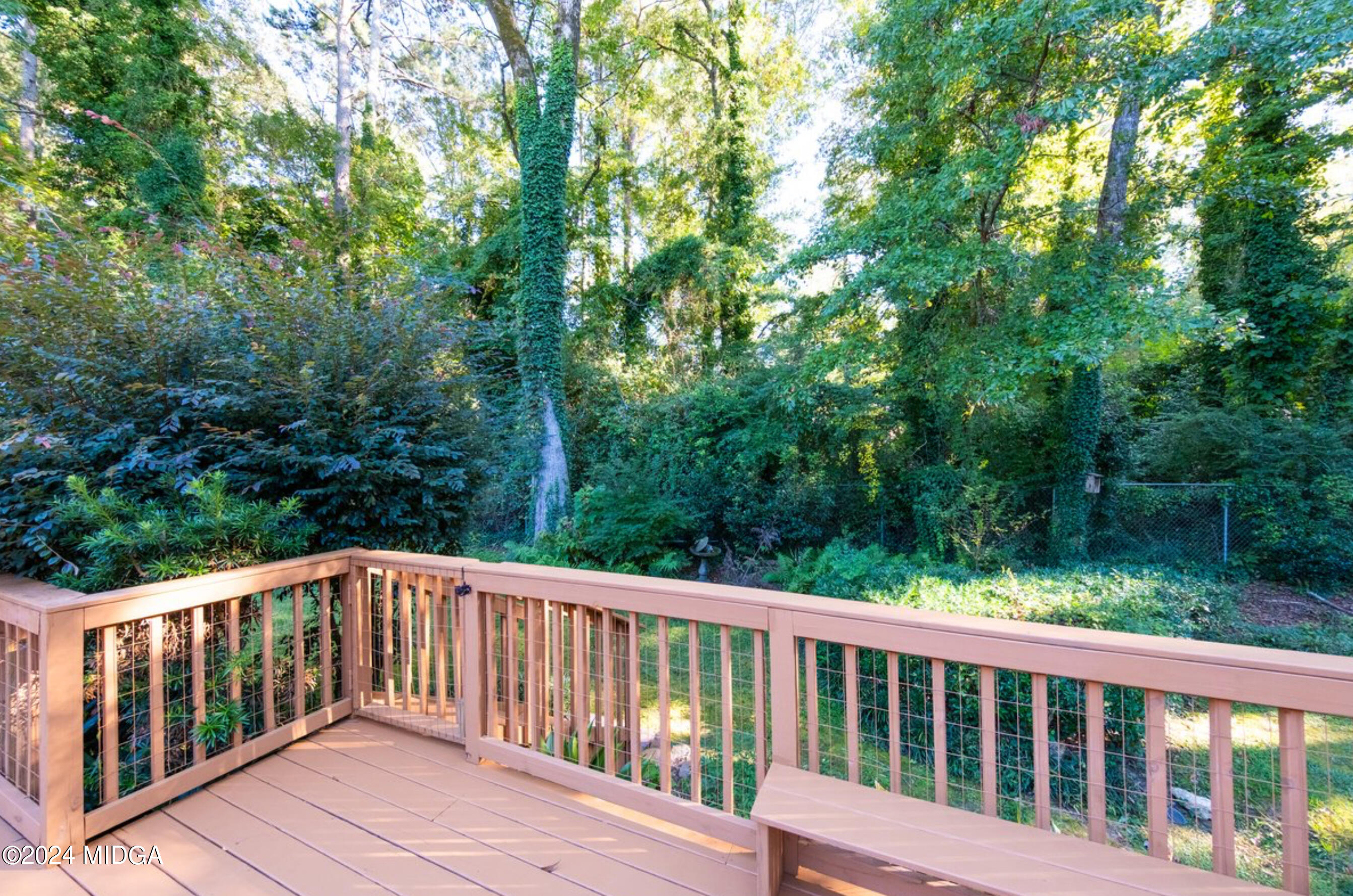 154 Lokchapee Landing Macon, GA 31210 - Photo 26 of 29 a balcony with wooden floor and fence
