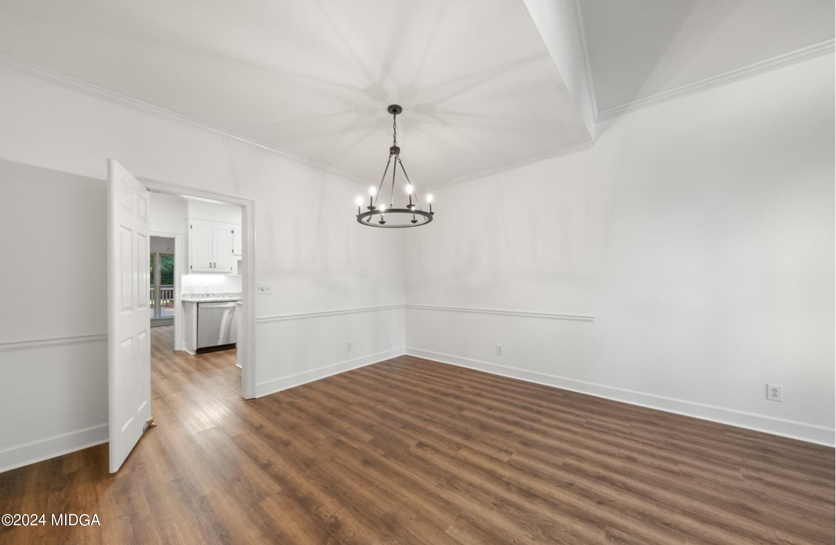 154 Lokchapee Landing Macon, GA 31210 - Photo 8 of 29 a view of a room with wooden floor and white walls