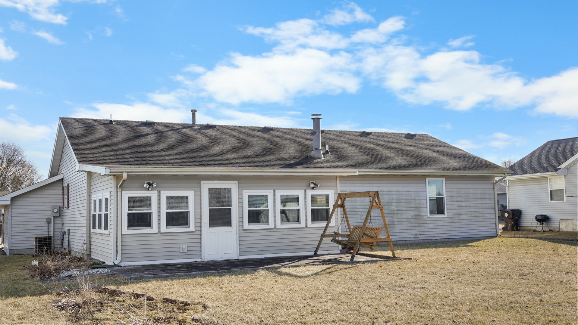 821 Park Drive Rantoul, IL 61866 - Photo 28 of 31 a view of a house with a patio