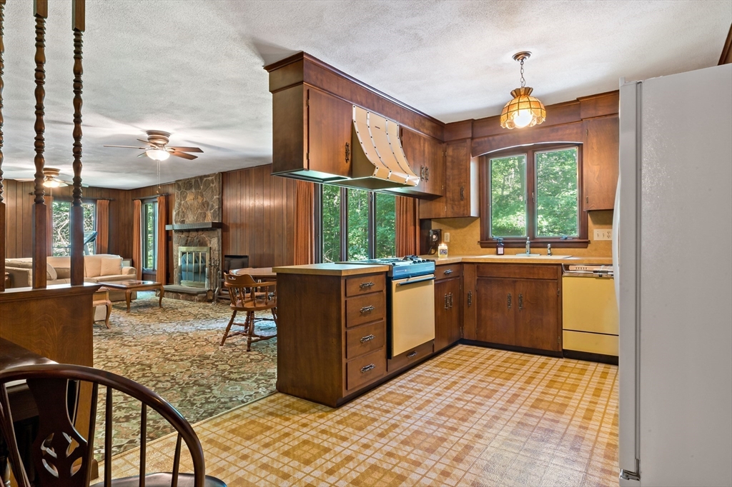 26 Danforth Street Rehoboth, MA 02769 - Photo 11 of 30 a kitchen with a sink a counter top space and appliances
