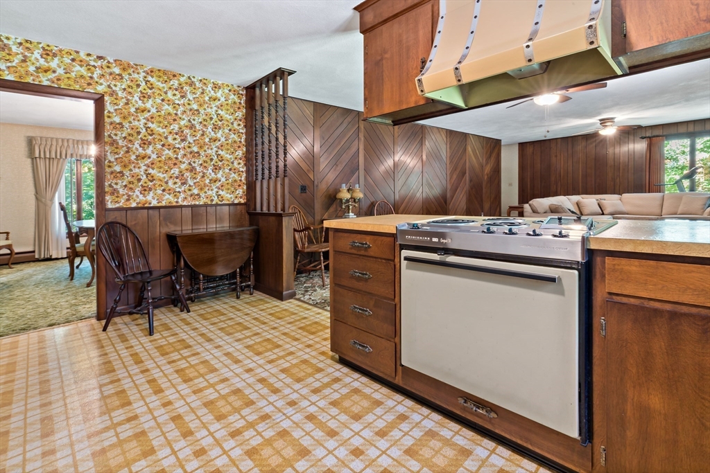 26 Danforth Street Rehoboth, MA 02769 - Photo 12 of 30 a kitchen that has a stove and a table