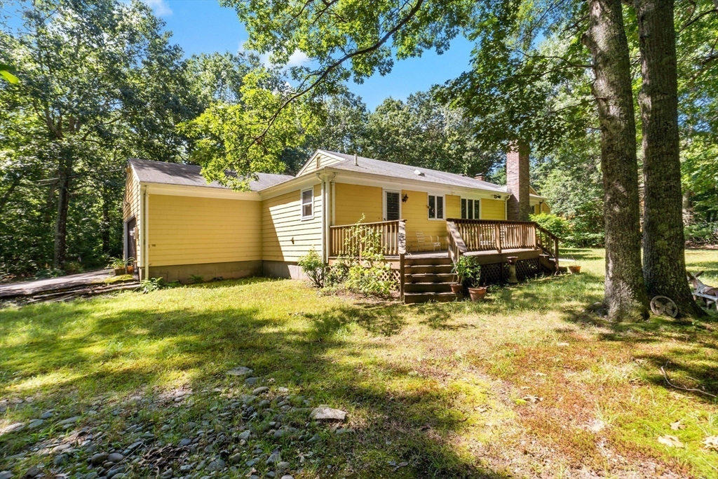 26 Danforth Street Rehoboth, MA 02769 - Photo 27 of 30 a view of a yard with plants and large tree