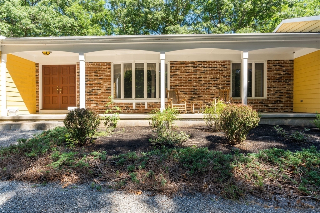 26 Danforth Street Rehoboth, MA 02769 - Photo 4 of 30 a front view of a house with garden