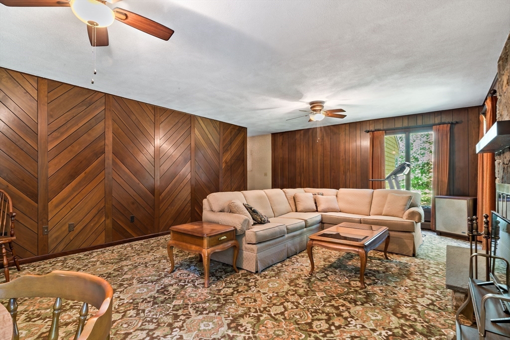 26 Danforth Street Rehoboth, MA 02769 - Photo 8 of 30 a living room with furniture and a large window